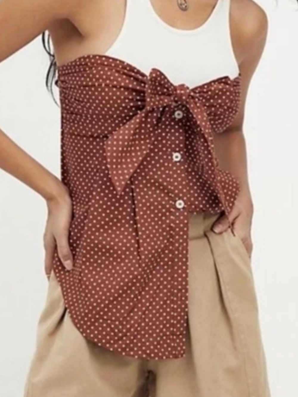 Free People top with a front tie bow. Rust With White Polka Dots